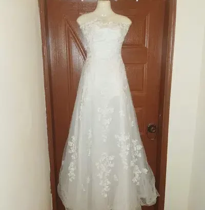 Christian Wedding Gowns 10,000 each also one bridal lehnga 25000